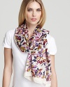 Transport your wardrobe into a wild garden in this beautifully gilded MARC BY MARC JACOBS floral scarf.