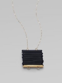 A striking, sculptural pendant formed of elongated black-finished beads hangs from a delicate chain in this modern design.Black platingGoldtoneLength, about 23Hook closureMade in USA A striking, sculptural pendant formed of elongated black-finished beads hangs from a delicate chain in this modern design.Black platingGoldtoneLength, about 23Hook closureMade in USA