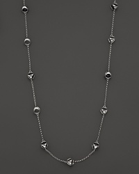 This bold sterling silver station necklace, gleaming with black onyx, is a brilliant showcase for Di MODOLO's iconic Triadra design. This bold sterling silver station necklace, gleaming with black onyx, is a brilliant showcase for Di MODOLO's iconic Triadra design.