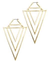 Channel 80s rock star style. RACHEL Rachel Roy's retro-chic earrings feature three cut-out triangles in gold tone mixed metal. Approximate drop: 3-3/4 inches. Channel 80s rock star style. RACHEL Rachel Roy's retro-chic earrings feature three cut-out triangles in gold tone mixed metal. Approximate drop: 3-3/4 inches.