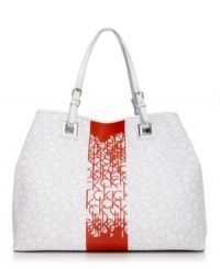 A vibrant pop of color adds a lively edge to this sleek Calvin Klein design. This spacious tote features a monogram exterior with signature hardware and a structured shape. A vibrant pop of color adds a lively edge to this sleek Calvin Klein design. This spacious tote features a monogram exterior with signature hardware and a structured shape.