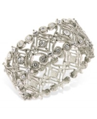 Glistening glass stones and scrolling designs lend appeal to this 2028 bracelet. Crafted in silver tone mixed metal. Approximate length: 7 inches. Glistening glass stones and scrolling designs lend appeal to this 2028 bracelet. Crafted in silver tone mixed metal. Approximate length: 7 inches.