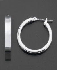 Modern hoops with an attractive shine, by GUESS. These earrings are crafted in silvertone mixed metal. Approximate diameter: 1 inch. Modern hoops with an attractive shine, by GUESS. These earrings are crafted in silvertone mixed metal. Approximate diameter: 1 inch.