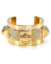 Rock a heavy metal: this Juicy Couture cuff works an edgy vibe, cast in plated metal with chunky stone accents. Rock a heavy metal: this Juicy Couture cuff works an edgy vibe, cast in plated metal with chunky stone accents.