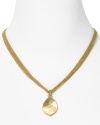 A gleaming hammered pendant finishes this multi-strand chain necklace from Lauren Ralph Lauren.
