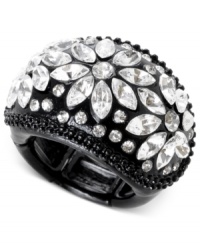Beauty is in full bloom. Betsey Johnson's stretch ring is crafted from black-plated mixed metal with glass crystal accents in flower shapes for a dazzling touch. Approximate size: 7-1/2 inches. Beauty is in full bloom. Betsey Johnson's stretch ring is crafted from black-plated mixed metal with glass crystal accents in flower shapes for a dazzling touch. Approximate size: 7-1/2 inches.