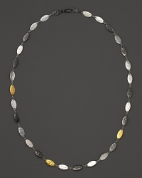 Gurhan's Willow necklace blends white silver, dark silver and 24 Kt. yellow gold in hammered leaf shapes to create a flowing, textured complement to your everyday attire. Gurhan's Willow necklace blends white silver, dark silver and 24 Kt. yellow gold in hammered leaf shapes to create a flowing, textured complement to your everyday attire.