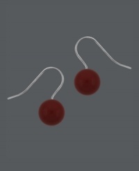 Add drops of color for a subtle, yet daring, look. Earrings by Avalonia Road feature round coral beads (10 mm) set in sterling silver -- the perfect mix for summer! Approximate drop: 3/4 inch.