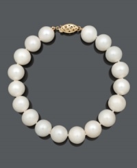 Embrace easy elegance with a simple strand of pearls. Bracelet features cultured freshwater pearls (10-11 mm) with a 14k gold clasp. Approximate length: 8 inches. Embrace easy elegance with a simple strand of pearls. Bracelet features cultured freshwater pearls (10-11 mm) with a 14k gold clasp. Approximate length: 8 inches.