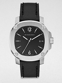 A classic timepiece with a brushed, stainless steel case and a luxurious, stitched leather strap. Quartz movementWater resistant to 5 ATMOctagonal stainless steel case, 43mm (1.7) Screw accented bezelBlack dialBar and numeric hour markersDate display at 3 o'clockSecond hand Black stitched leather strapMade in Switzerland A classic timepiece with a brushed, stainless steel case and a luxurious, stitched leather strap. Quartz movementWater resistant to 5 ATMOctagonal stainless steel case, 43mm (1.7) Screw accented bezelBlack dialBar and numeric hour markersDate display at 3 o'clockSecond hand Black stitched leather strapMade in Switzerland