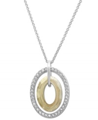 Go for the gold! Swarovski's Logan Golden Shadow crystal pendant necklace features an dramatic double oval silhouette. Adorned with sparkling clear pavé crystals, it's made in mixed metal. Approximate length: 15 inches. Approximate drop: 1 inch. Go for the gold! Swarovski's Logan Golden Shadow crystal pendant necklace features an dramatic double oval silhouette. Adorned with sparkling clear pavé crystals, it's made in mixed metal. Approximate length: 15 inches. Approximate drop: 1 inch.