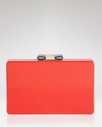 Perfect the hand-off with this clutch from kate spade new york. Boxy and bold, it has just the right amount of ladylike glamor, thanks to it's glossy hue and bow detailing. Perfect the hand-off with this clutch from kate spade new york. Boxy and bold, it has just the right amount of ladylike glamor, thanks to it's glossy hue and bow detailing.