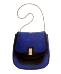 Clean lines and a mod appeal. This poised shoulder bag from Danielle Nicole features polished gold-tone hardware and a high-shine chain strap. Clean lines and a mod appeal. This poised shoulder bag from Danielle Nicole features polished gold-tone hardware and a high-shine chain strap.