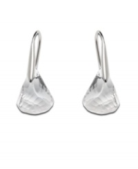 Crystallize your look in chic drops by Swarovski. Earrings feature clear crystals in silver tone mixed metal. Approximate drop: 1-1/10 inches.