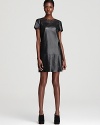 Leather is never better than when interpreted by DIANE von FURSTENBERG. With a cutout neck, drop waist and single defining pleat, this chic dress toes the line between hot and haute.