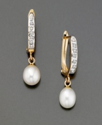 Eternally elegant, these earrings feature cultured freshwater pearls (6 mm) and diamond accents. Set in 14k gold. 1 inch drop. Eternally elegant, these earrings feature cultured freshwater pearls (6 mm) and diamond accents. Set in 14k gold. 1 inch drop.