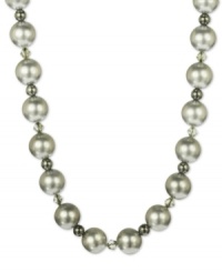 A splendid mix of shimmer. This stunning necklace combines shell beads (14 mm), sparkling hematite (34-3/4 ct. t.w.) and Swarovski Elements. Set in sterling silver. Approximate length: 18 inches. A splendid mix of shimmer. This stunning necklace combines shell beads (14 mm), sparkling hematite (34-3/4 ct. t.w.) and Swarovski Elements. Set in sterling silver. Approximate length: 18 inches.