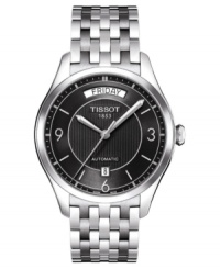 Classically handsome, this automatic Tissot watch features a stainless steel bracelet and round case. Black textured dial with logo, day window, date window, silvertone stick indices and numerals at three o'clock, six o'clock and nine o'clock. Automatic movement. Water resistant to 50 meters. Two-year limited warranty. Classically handsome, this automatic Tissot watch features a stainless steel bracelet and round case. Black textured dial with logo, day window, date window, silvertone stick indices and numerals at three o'clock, six o'clock and nine o'clock. Automatic movement. Water resistant to 50 meters. Two-year limited warranty.