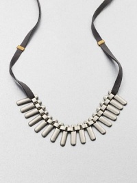 This technical, yet delicate design features a fan of long, metal beads on textured ribbon. Silver-platedCotton ribbonLength, about 54.5Tie closureMade in USA This technical, yet delicate design features a fan of long, metal beads on textured ribbon. Silver-platedCotton ribbonLength, about 54.5Tie closureMade in USA