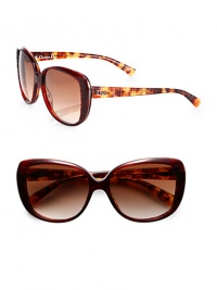 An oversized frame is given an ultra-cool update in textured acetate with logo temples. Available in brown havana with brown gradient lens or red havana with red gradient lens.Logo temples100% UV protectionMade in Italy An oversized frame is given an ultra-cool update in textured acetate with logo temples. Available in brown havana with brown gradient lens or red havana with red gradient lens.Logo temples100% UV protectionMade in Italy