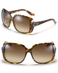 Oversized rectangle sunglasses with signature Gucci logo embellishment at temples. Oversized rectangle sunglasses with signature Gucci logo embellishment at temples.