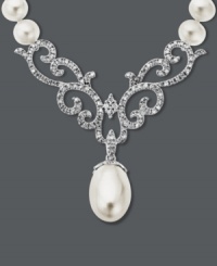 This necklace proves paisley isn't just for prints. An intricate cut-out design adorned with round-cut diamonds (3/8 ct. t.w.) and cultured freshwater pearls (8 mm x 12 mm) creates a standout look. Set in 14k white gold. Approximate length: 16 inches. Approximate drop: 1-1/2 inches. This necklace proves paisley isn't just for prints. An intricate cut-out design adorned with round-cut diamonds (3/8 ct. t.w.) and cultured freshwater pearls (8 mm x 12 mm) creates a standout look. Set in 14k white gold. Approximate length: 16 inches. Approximate drop: 1-1/2 inches.