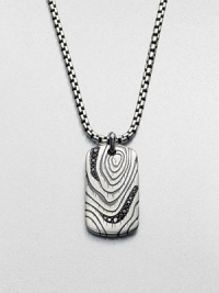 Casual elegance defines this sterling silver dog tag pendant with wood grain detail, tastefully adorned with black diamonds.Sterling silverBlack diamondLength, about 22Lobster claspImported Casual elegance defines this sterling silver dog tag pendant with wood grain detail, tastefully adorned with black diamonds.Sterling silverBlack diamondLength, about 22Lobster claspImported