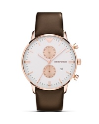 Ever-chic with modern touches. Emporio Armani's round-face watch is the ideal around-the-clock piece, accented by a rose-gold plated case with a sleek leather strap. Ever-chic with modern touches. Emporio Armani's round-face watch is the ideal around-the-clock piece, accented by a rose-gold plated case with a sleek leather strap.