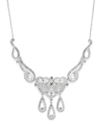 Stylish illumination. Eliot Danori's dazzling and dramatic frontal necklace highlights shimmering crystals in an intricate silver tone mixed metal setting. Approximate length: 16 inches + 2-inch extender. Approximate drop length: 4 inches. Approximate width: 5 inches. Stylish illumination. Eliot Danori's dazzling and dramatic frontal necklace highlights shimmering crystals in an intricate silver tone mixed metal setting. Approximate length: 16 inches + 2-inch extender. Approximate drop length: 4 inches. Approximate width: 5 inches.