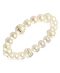 Elegance defined. This pretty stretch bracelet combines cultured freshwater pearls (8-10 mm) and cubic zirconia accents in a polished 18k gold over sterling silver setting. Approximate length: 7-1/2 inches. Elegance defined. This pretty stretch bracelet combines cultured freshwater pearls (8-10 mm) and cubic zirconia accents in a polished 18k gold over sterling silver setting. Approximate length: 7-1/2 inches.