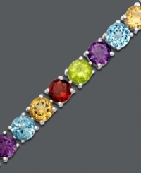 A rainbow of gemstones makes any day brighter. Get swept away with alternating round-cut blue topaz (4-1/2 ct. t.w.), amethyst (2-3/4 ct. t.w.), citrine (3-1/2 ct. t.w.), garnet (3-5/8 ct. t.w.) and peridot (3-3/4 ct. t.w.). Bracelet crafted in sterling silver. Approximate length: 7 inches. A rainbow of gemstones makes any day brighter. Get swept away with alternating round-cut blue topaz (4-1/2 ct. t.w.), amethyst (2-3/4 ct. t.w.), citrine (3-1/2 ct. t.w.), garnet (3-5/8 ct. t.w.) and peridot (3-3/4 ct. t.w.). Bracelet crafted in sterling silver. Approximate length: 7 inches.