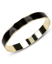 Midnight cool from Anne Klein. This bangle bracelet sets the mood with jet black enamel and golden shine. Crafted in gold tone mixed metal. Approximate diameter: 2-1/2 inches.