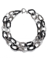 Neutral territory. With its practical black and gray palette, c.A.K.e. by Ali Khan's double necklace will mix and match effortlessly within your wardrobe. Adorned with faceted glass rondelle accents, it's made in silver tone mixed metal and includes a toggle closure. Approximate length: 18 inches. Neutral territory. With its practical black and gray palette, c.A.K.e. by Ali Khan's double necklace will mix and match effortlessly within your wardrobe. Adorned with faceted glass rondelle accents, it's made in silver tone mixed metal and includes a toggle closure. Approximate length: 18 inches.