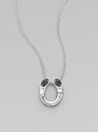 A black sapphire adorned pendant on a delicate chain. Black sapphires Sterling silver Length, about 18 Pendant size, about ¾L X ½ W Imported A black sapphire adorned pendant on a delicate chain. Black sapphires Sterling silver Length, about 18 Pendant size, about ¾L X ½ W Imported