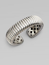 A substantial cuff in a textural design. Sterling silver Kick mechanism closure Diameter, about 2½ Imported A substantial cuff in a textural design. Sterling silver Kick mechanism closure Diameter, about 2½ Imported