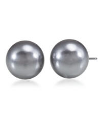 Stud earrings in a neutral hue are the perfect complement to any ensemble. These shining studs by Carolee feature a charcoal-colored glass pearl (12 mm) in a silvertone mixed metal setting. Surgical steel posts. Stud earrings in a neutral hue are the perfect complement to any ensemble. These shining studs by Carolee feature a charcoal-colored glass pearl (12 mm) in a silvertone mixed metal setting. Surgical steel posts.