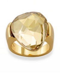 Add a touch of summer to your look in this standout Swarovski piece. Crafted from gold tone mixed metal, a prominent Desert Glow Glacier-cut crystal reflects the sunlight marvelously, radiating an array of honey-colored hues. Size 7. Add a touch of summer to your look in this standout Swarovski piece. Crafted from gold tone mixed metal, a prominent Desert Glow Glacier-cut crystal reflects the sunlight marvelously, radiating an array of honey-colored hues. Size 7.