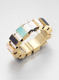From the Metalphysic Collection. This stunning circle of chunky semi-precious stones, joined by leather and freshwater pearls, is wonderfully described by its designer as macromosaic.Howlite, pink opal, black onyx, blue aventurine, amazonite and madrepora stonesFreshwater pearlsLeather18k goldplated sterling silverDiameter, about 2¼Width, about ½Hinged spring claspMade in Italy From the Metalphysic Collection. This stunning circle of chunky semi-precious stones, joined by leather and freshwater pearls, is wonderfully described by its designer as macromosaic.Howlite, pink opal, black onyx, blue aventurine, amazonite and madrepora stonesFreshwater pearlsLeather18k goldplated sterling silverDiameter, about 2¼Width, about ½Hinged spring claspMade in Italy
