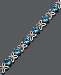 Sweeten your look for spring. Bracelet features round-cut blue topaz (9-1/2 ct. t.w.) and sterling silver flowers accented by sparkling diamonds. Approximate length: 7 inches. Sweeten your look for spring. Bracelet features round-cut blue topaz (9-1/2 ct. t.w.) and sterling silver flowers accented by sparkling diamonds. Approximate length: 7 inches.