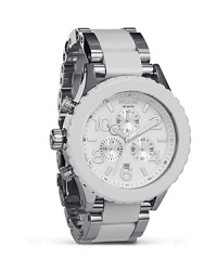 Modern and masculine. Nixon's silvery chronograph is a forward fasten-on that keeps pace with everything from strict tailoring to casual off-duty looks. Modern and masculine. Nixon's silvery chronograph is a forward fasten-on that keeps pace with everything from strict tailoring to casual off-duty looks.