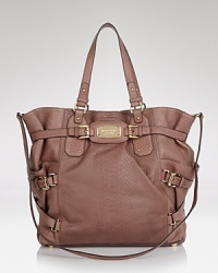Throw something chic over your shoulder with this tote from MICHAEL Michael Kors. In suede with a roomy interior and versatile strap design, it's the daytime bag that no outfit should be without. Throw something chic over your shoulder with this tote from MICHAEL Michael Kors. In suede with a roomy interior and versatile strap design, it's the daytime bag that no outfit should be without.
