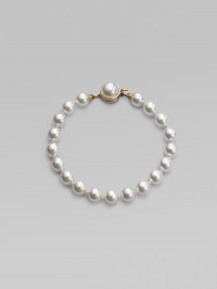 A single strand of round white pearls is an eternally elegant essential. 8mm white organic man-made pearls Length, about 7 18k goldplated sterling silver mabé pearl push-lock clasp Made in Spain A single strand of round white pearls is an eternally elegant essential. 8mm white organic man-made pearls Length, about 7 18k goldplated sterling silver mabé pearl push-lock clasp Made in Spain