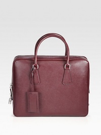 Structured and sophisticated, crafted in richly textured saffiano leather.Zip closureDouble top handlesInterior zip pocketIdentification tagLeather14W x 11H x 4DMade in Italy Structured and sophisticated, crafted in richly textured saffiano leather.Zip closureDouble top handlesInterior zip pocketIdentification tagLeather14W x 11H x 4DMade in Italy