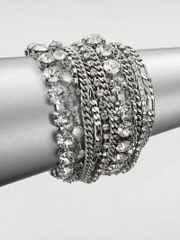 Make a statement in this chunky and sparkly, multi-row design with various link chains punctuated with faceted stones. BrassGlassLength, about 7.5Magnetic closureImported Make a statement in this chunky and sparkly, multi-row design with various link chains punctuated with faceted stones. BrassGlassLength, about 7.5Magnetic closureImported