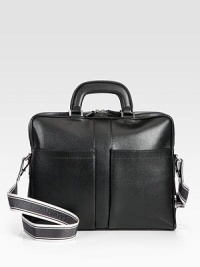 A pebbled leather style with two convenient outside pockets.Zip closureTop handlesWoven signature shoulder strapTwo outside open pocketsTwo inner compartmentsOne inside zip pocketCotton lining14½W X 11½H X 2¼DMade in Italy A pebbled leather style with two convenient outside pockets.Zip closureTop handlesWoven signature shoulder strapTwo outside open pocketsTwo inner compartmentsOne inside zip pocketCotton lining14½W X 11½H X 2¼DMade in Italy