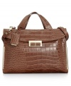 Carry off the season's exotic trend with this faux croc-embossed leather briefcase  from Ivanka Trump. Outfitted with luxe, golden hardware and signature detailing, the interior effortlessly stows your iPad and other everyday essentials.