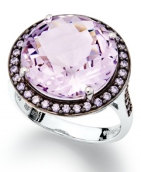 Punctuate your look with pastels. This stunning sterling silver ring highlights a round-cut natural pink amethyst (7-1/5 ct. t.w.) and a halo of round-cut purple Swarovski zirconias (5/8 ct. t.w.). Size 7.