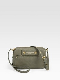 A compact, ultra-protective shape made of buttery smooth leather. Adjustable shoulder strap, 18-22 dropTop zip closureOne outside open pocketOne inside zip pocketTwo inside open pocketsFully lined9W X 6H X 1½DImportedPlease note: hardware color may vary. A compact, ultra-protective shape made of buttery smooth leather. Adjustable shoulder strap, 18-22 dropTop zip closureOne outside open pocketOne inside zip pocketTwo inside open pocketsFully lined9W X 6H X 1½DImportedPlease note: hardware color may vary.