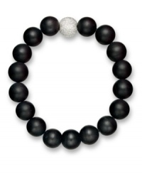 Embolden your look. Matte black agate beads (62-1/2 ct. t.w.) and a textured sterling silver bead make any look pop on this dramatic stretch bracelet. Beads strung on a nylon cord. Approximate length: 8 inches. Embolden your look. Matte black agate beads (62-1/2 ct. t.w.) and a textured sterling silver bead make any look pop on this dramatic stretch bracelet. Beads strung on a nylon cord. Approximate length: 8 inches.
