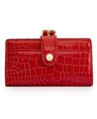 Add some uptown attitude to your everyday accessorizing with this posh, clutch purse from Style&co. Chic croc-embossed pattern and gleaming custom hardware offer undeniable elegance, while the interior is aligned with plenty of compartments for cards, cash, coins and ID. Add some uptown attitude to your everyday accessorizing with this posh, clutch purse from Style&co. Chic croc-embossed pattern and gleaming custom hardware offer undeniable elegance, while the interior is aligned with plenty of compartments for cards, cash, coins and ID.